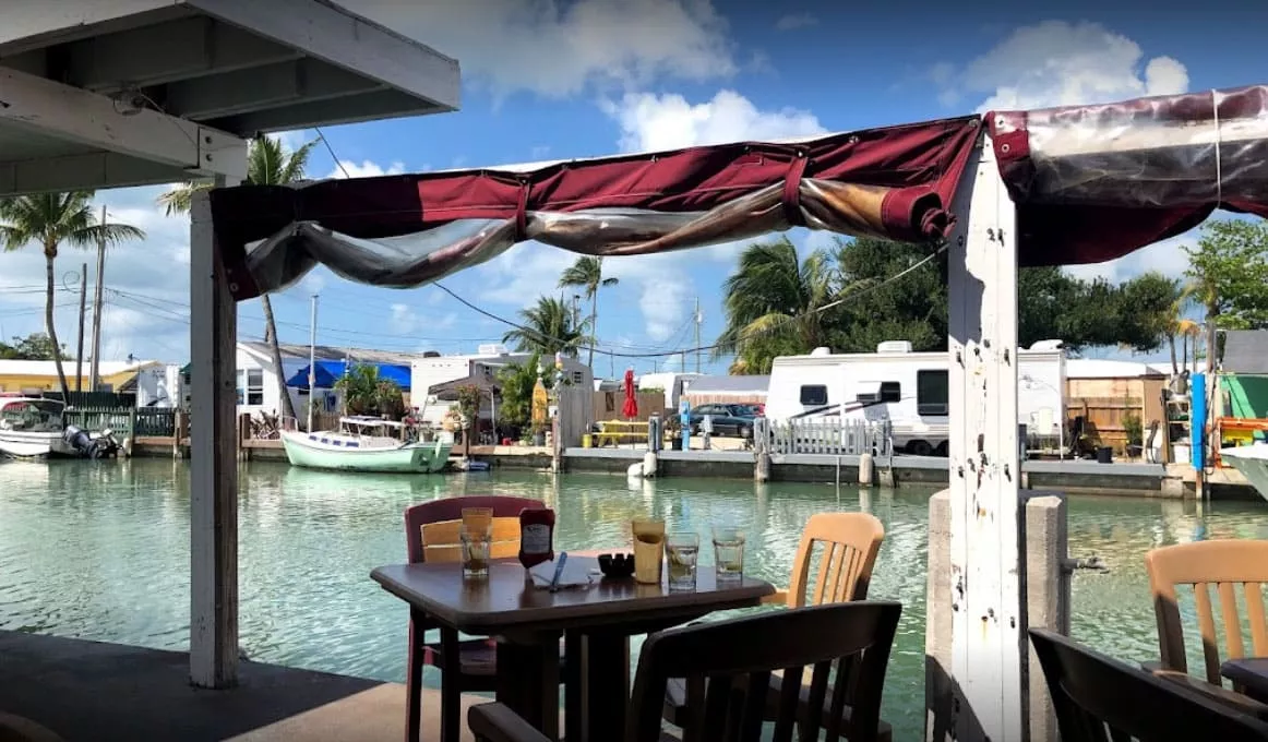 table and chairs on Castaways Restaurant dock 